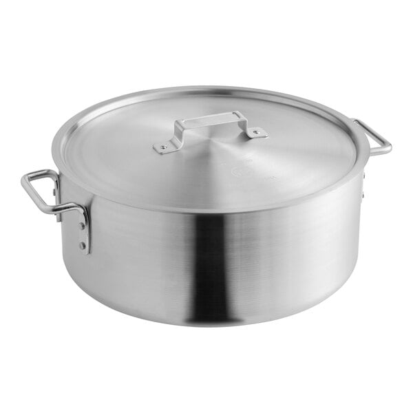 A stainless steel pot with a lid and side handles, part of a 12-cup egg poacher set.