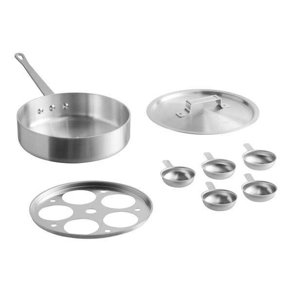 A stainless steel 5-cup egg poacher set with a sauté pan, lid, poaching insert, and five individual egg cups.