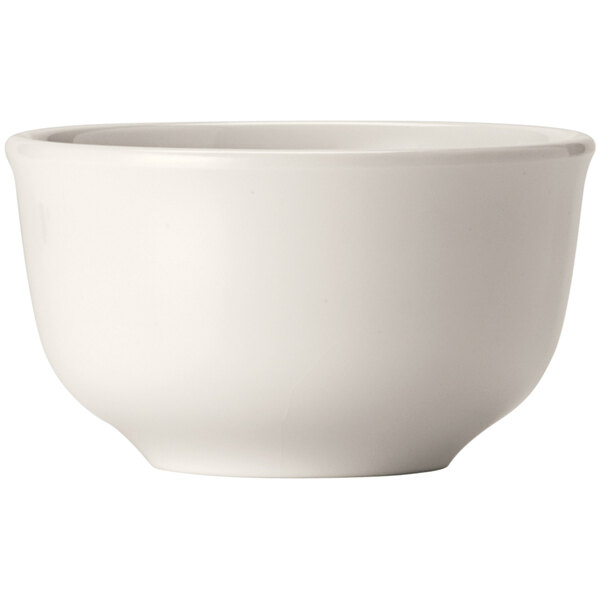 a white bowl with a handle