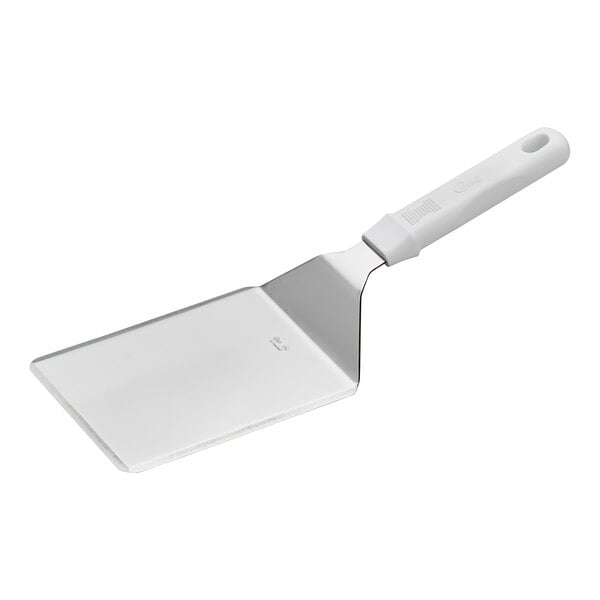 A square edge turner with a 6 by 5 inch stainless steel blade and a white polypropylene handle.