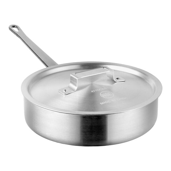 A stainless steel sauté pan with a lid and a long handle.