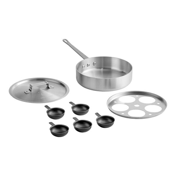 A stainless steel sauté pan set with a lid, a metal insert with five circular openings, and five small non-stick cups with handles.