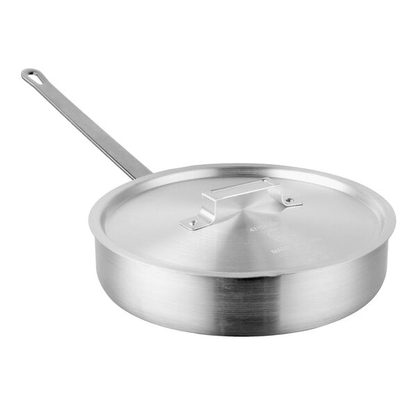 A stainless steel sauté pan with a matching lid and a long handle.
