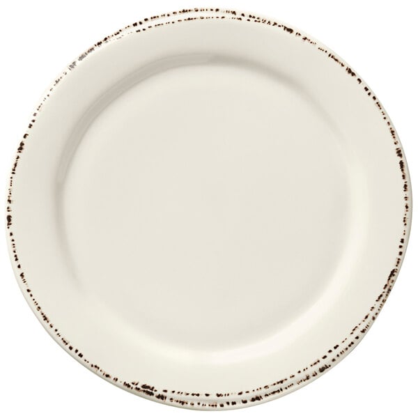 A white Libbey melamine plate with brown speckled edges.