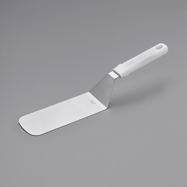 A white spatula with a white handle.