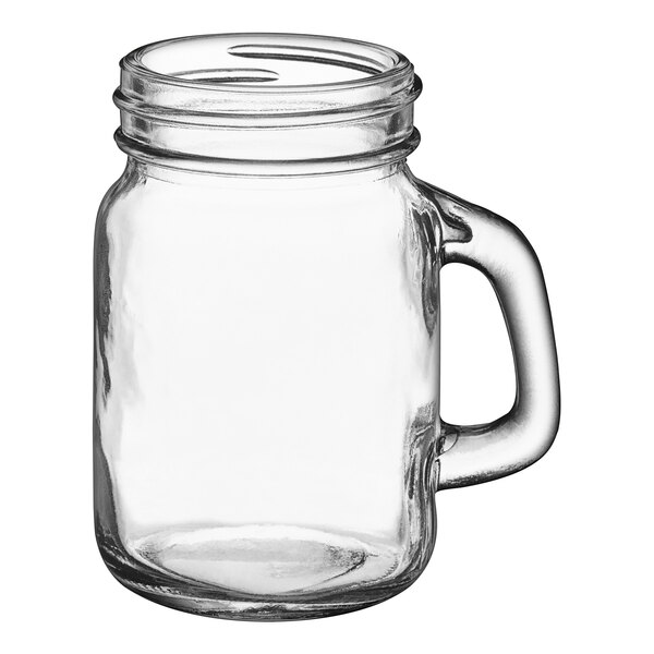 An Arcoroc clear glass jar with a handle.