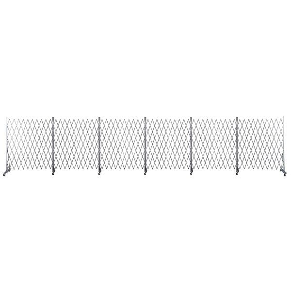 A silver Versare Lock-N-Block security gate in a fence.
