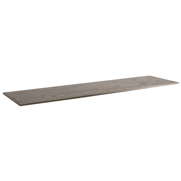 A Cal-Mil gray oak wood shelf on a wooden table.