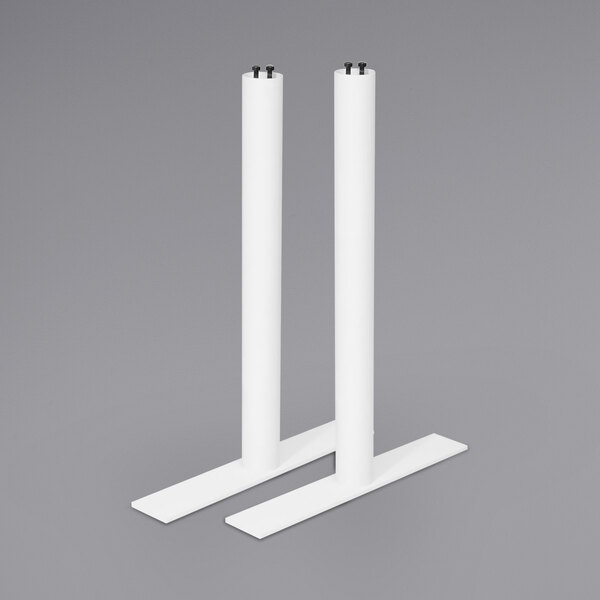 a pair of white pillars