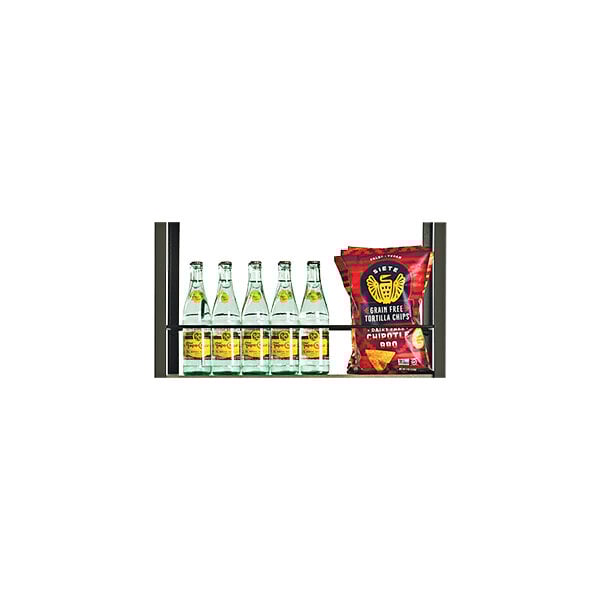 A black Cal-Mil rail holding clear bottles and a bag of chips.