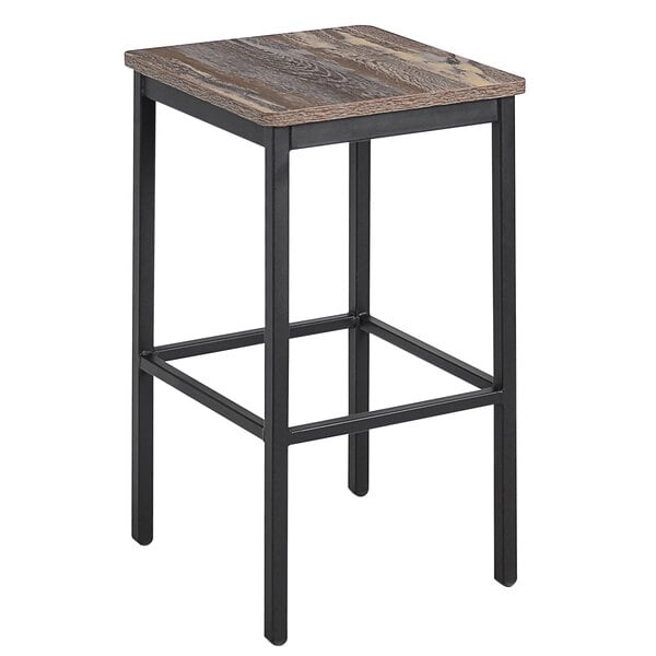 A BFM Seating black steel backless barstool with a wood seat.