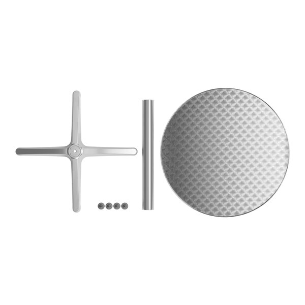 A metal plate with screws and a cross, attached to a Lancaster Table & Seating outdoor table.