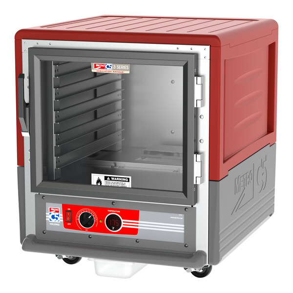 A red and grey Metro C5 heated holding cabinet with a clear door open.