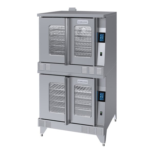 A white Garland double deck convection oven with glass doors.