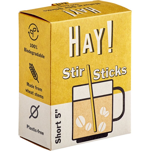 a yellow and white box with a picture of a drink and straw