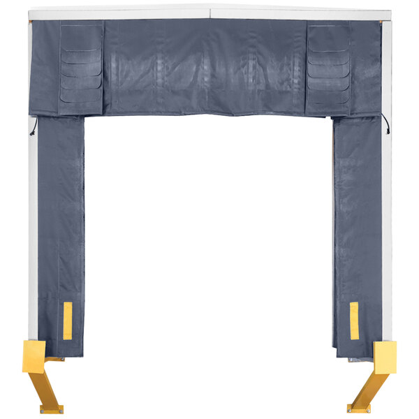 A grey fabric Dock Shelter with yellow trim.
