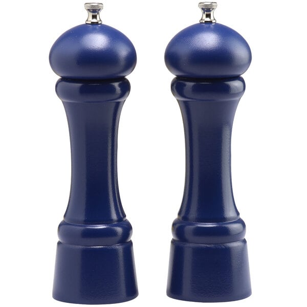 Two blue salt and pepper mills with a white top.
