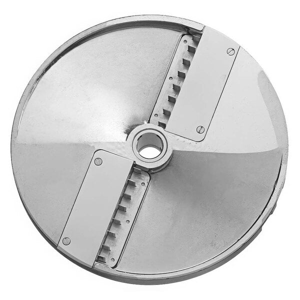 A circular metal Sirman food processor disc with a hole and two blades.