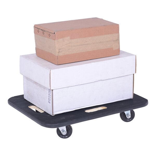 A white cardboard box on a black Vestil fiber wood dolly with black non-marking casters.