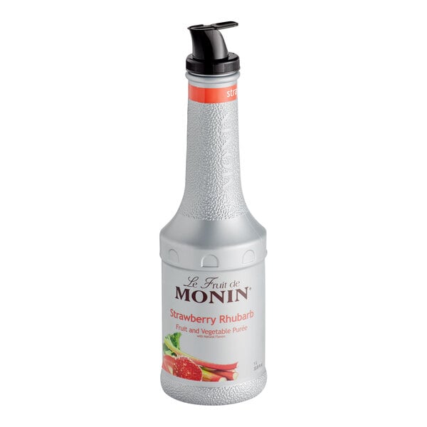 A Monin bottle of Strawberry Rhubarb fruit puree with a dispenser.