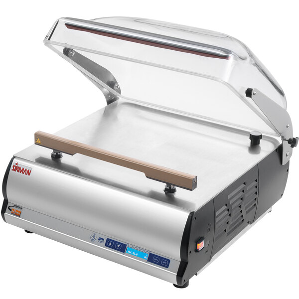 A silver and black Sirman W8 50 DX vacuum packaging machine on a counter.