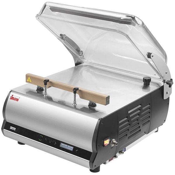 A Sirman DX8 vacuum packaging machine with a clear cover.