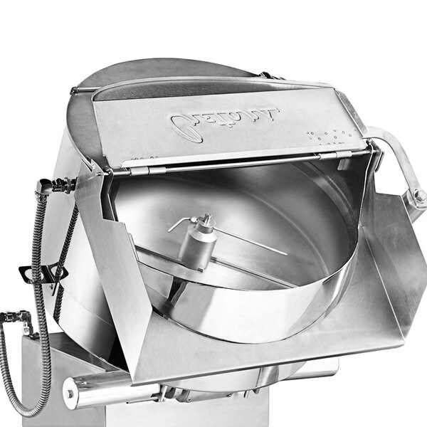 A Cretors stainless steel popcorn popper with a lid.