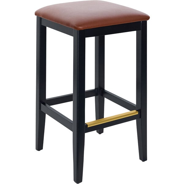 A black BFM Seating Stockton barstool with a light brown vinyl seat.