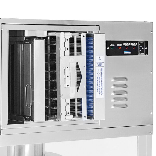 A Cretors stainless steel floor model popcorn popper with a door open.