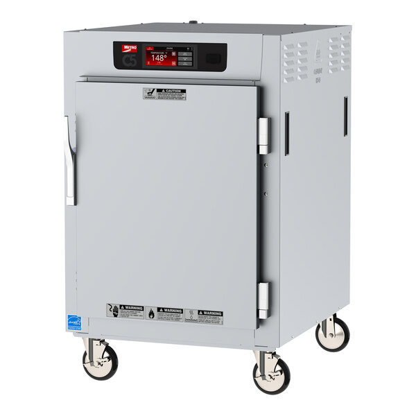 A white Metro C5 holding cabinet with wheels and a solid door.