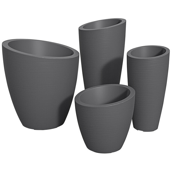A Mayne Modesto graphite grey planter set with four different sizes.
