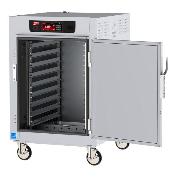 A Metro C5 series low wattage holding cabinet with a solid door open.