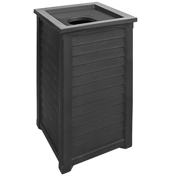 A black rectangular Mayne Lakeland decorative trash bin with a lid on it.