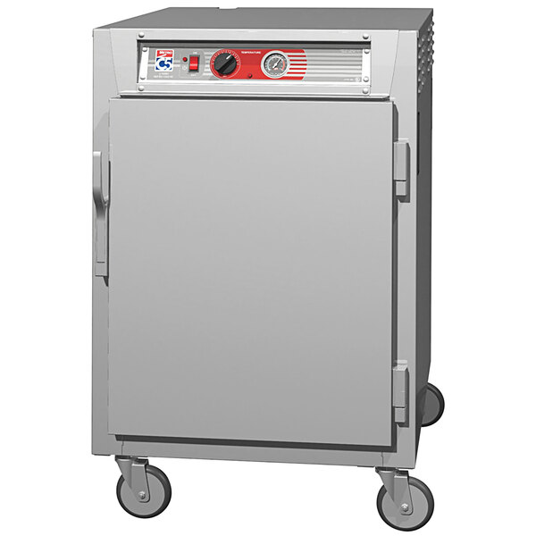 A white rectangular Metro holding cabinet with a solid stainless steel door.