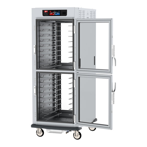 A Metro C5 pass-through holding cabinet with clear Dutch doors.