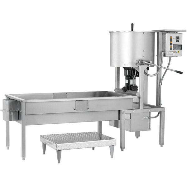 A Cretors stainless steel caramelizer with a large tank.