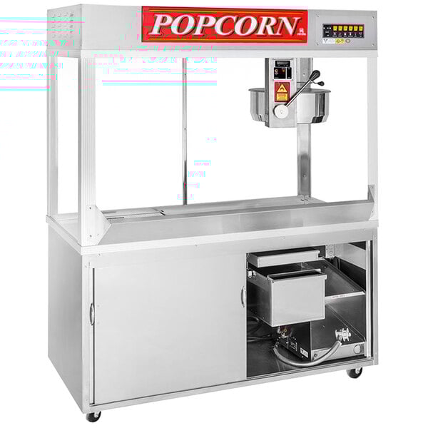 A Cretors popcorn popper with a stainless steel cabinet and a large container.