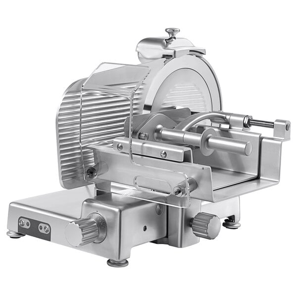 A silver Sirman manual meat slicer with a round metal surface.