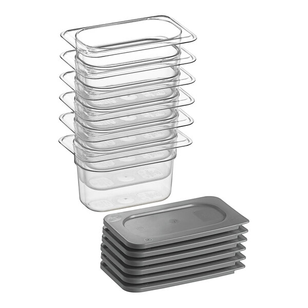 A stack of six clear plastic Vigor food pans with lids.