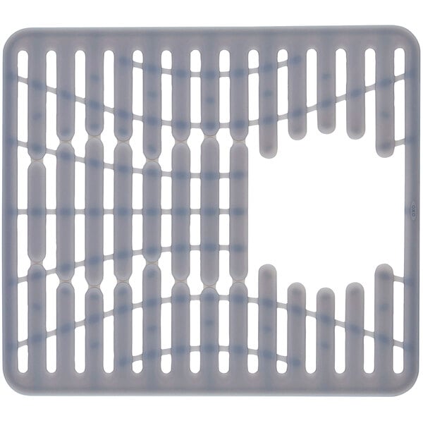 A white plastic sink mat with holes.