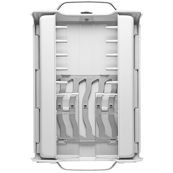 A white plastic OXO dish rack with silver accents and several compartments.