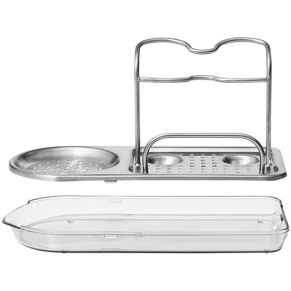 An OXO stainless steel sink organizer tray on a metal tray.