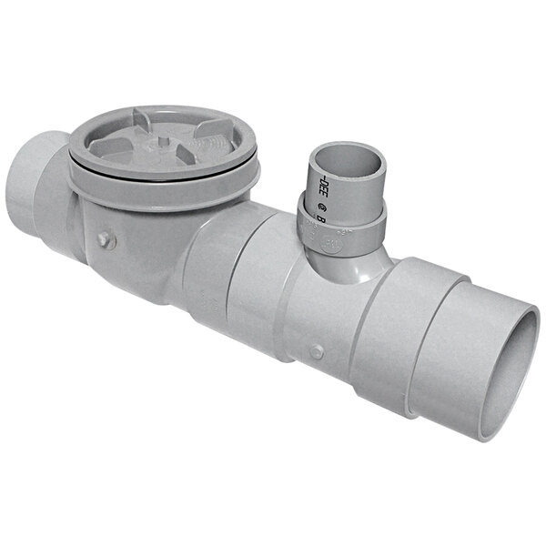 A grey plastic pipe with a round cap.