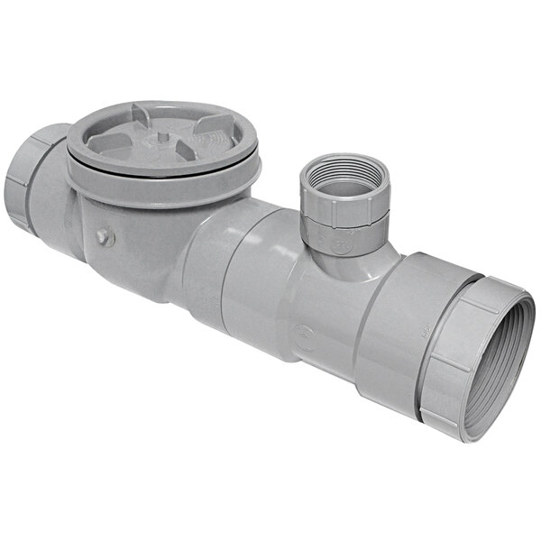 A grey pipe with a round cap and a valve on the side.