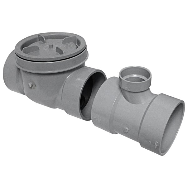 A grey plastic Endura cleanout pipe with a lid.