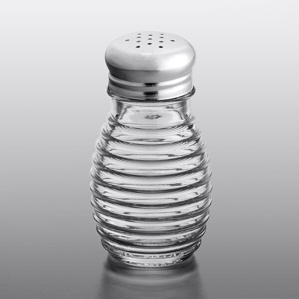 A Tablecraft glass salt shaker with a stainless steel top.