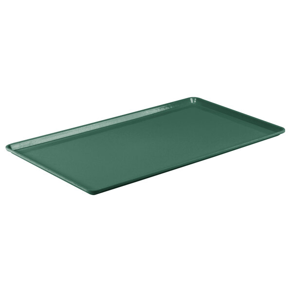 A green Cambro dietary tray with a rectangular shape.