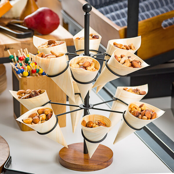 A Tablecraft 2-tier cone holder filled with nuts.