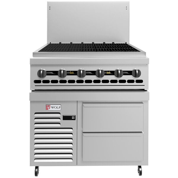 A stainless steel Wolf Challenger liquid propane charbroiler with a refrigerated base.