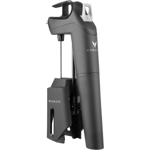 A close-up of a black Coravin Timeless Three Plus wine preservation system.